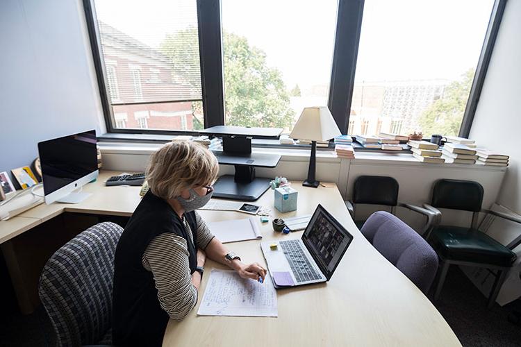 A professor using Zoom to teach a class.