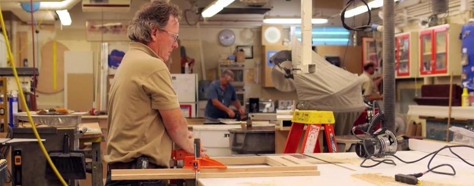 A woodworker building a cabinet.